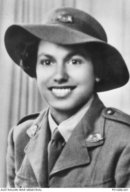 Studio portrait of Aboriginal servicewoman, QF267190 Lance Corporal Kathleen Jean Mary Walker, a communication worker with the Australian Women's Army. Australian War Memorial. Image Number: oai:awm.gov.au:P01688-001.